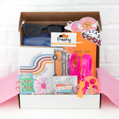 Get ready for summer with our subscription box! Includes sunglasses in a case, surf wax tin of chapstick, summer greeting card, and surf van air freshener. Perfect for beach lovers and surfers. Shop now on Ratbone Skinny and enjoy the sun in style!